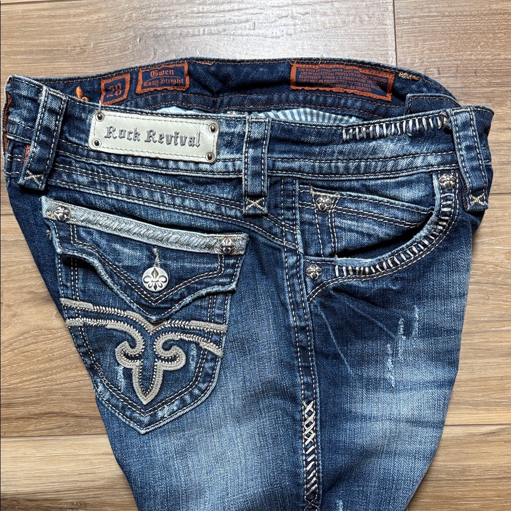 Rock Revival Dark Blue Denim Jeans with Silver Accents
